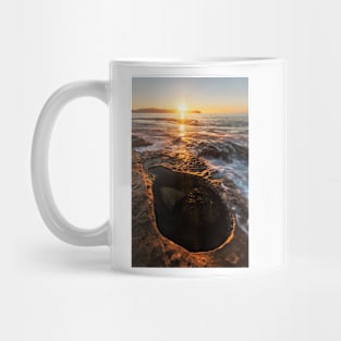 Sunrise over the rockpool Mug